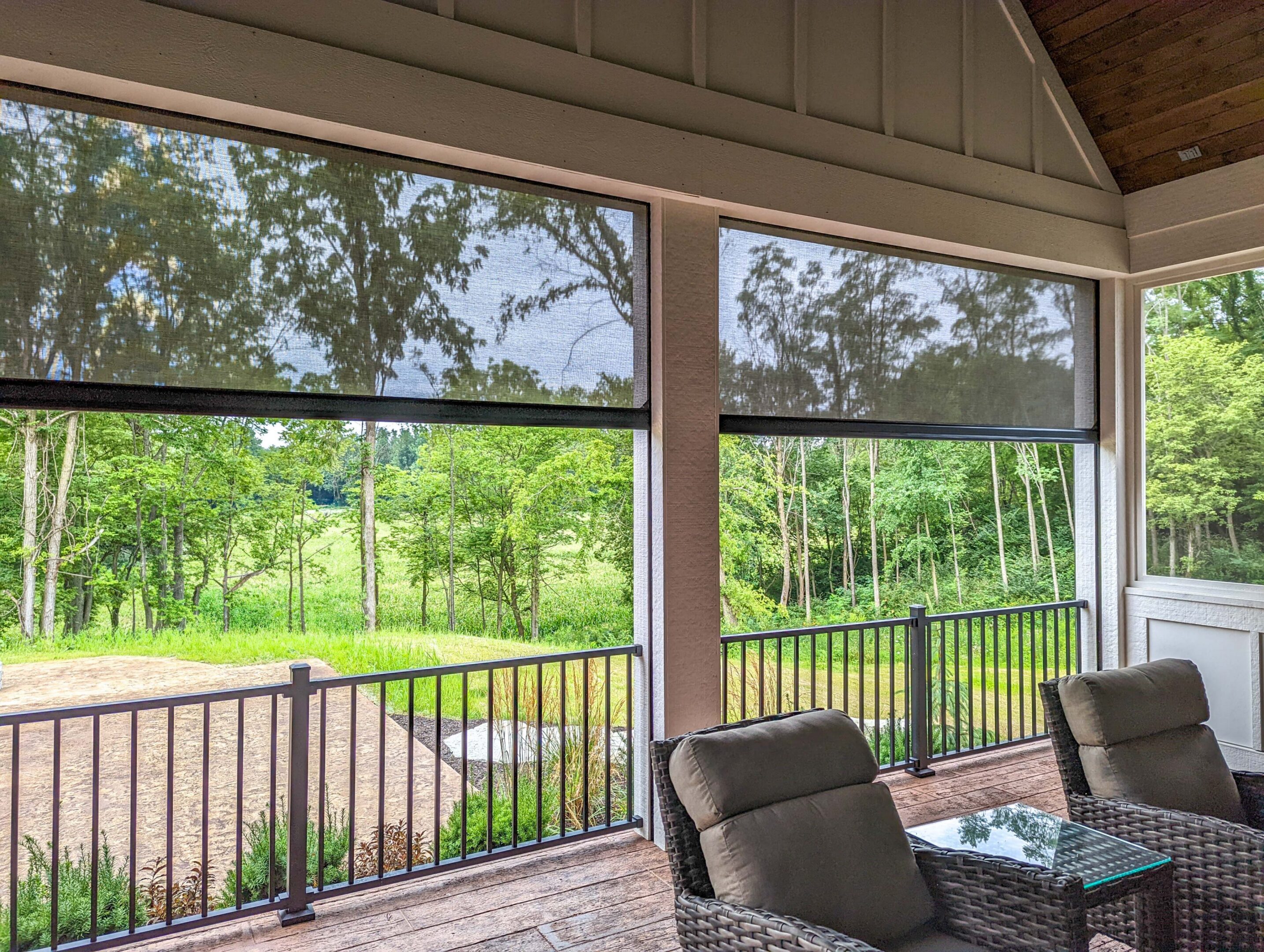 Covered porch with roller shades and seating